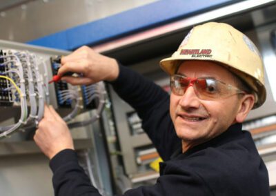 Heartland electrician working happily